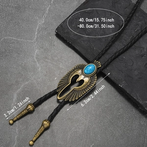 Detail of adjustable eagle bolo tie with turquoise stone and braided leather cord