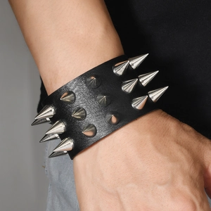 Punk style wide black leather wristband featuring three rows of sharp silver metal spikes