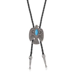 Vintage western bolo tie with silver thunderbird pendant and turquoise stone on black cord