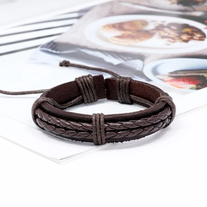 Bracciale classico in pelle intrecciata testa di moro con cordini regolabili e design vintage