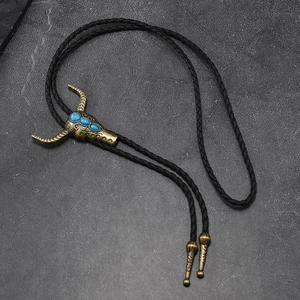 Vintage Bolo-Krawatte mit Stierschädel-Anhänger und Türkissteinen auf schwarzer Kordel