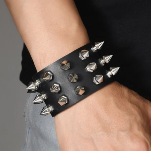 Gothic punk black leather cuff bracelet featuring three rows of silver metal spikes
