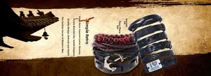 Close-up of vintage leather bracelet set with anchor charm and I Love Jesus metal tag