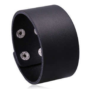 Punk black leather wide bracelet with silver metal snap buttons on a white background