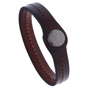 Detail of dark brown leather bracelet featuring contrast stitching and vintage metal snap