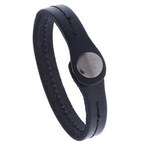 Detail shot of black leather wristband with visible stitching and silver metal snap button