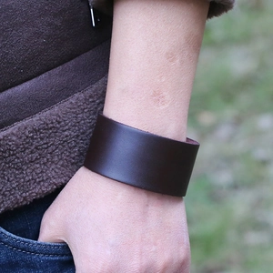 Minimalist wide dark brown leather bracelet for men with vintage punk style aesthetic