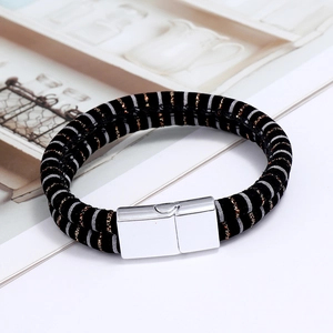 Detail of double-strand men's leather bracelet with a silver rectangular magnetic clasp