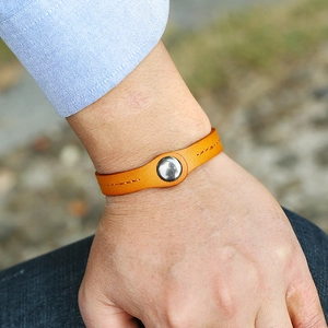 Minimalist punk genuine leather bracelet in ginger orange color with silver snap button
