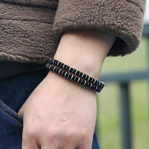Men's double-wrap braided leather bracelet with black and white stripes and silver magnetic clasp