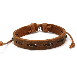 Detail of vintage brown leather woven bracelet with bronze beads and adjustable knot