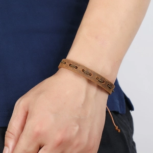 Vintage braided brown leather bracelet with bronze metal beads for men and women