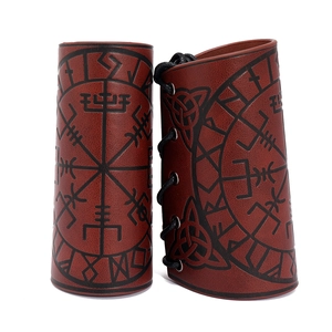 Brown Viking arm guards with Vegvisir compass engraving and Celtic knot patterns