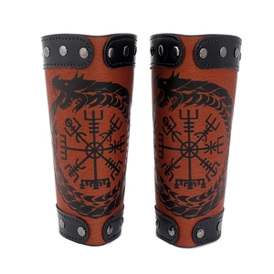 Brown medieval leather bracers with viking Vegvisir compass and dragon embossing