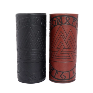 Close-up of Nordic Valknut symbol and rune embossing on vintage faux leather arm guards