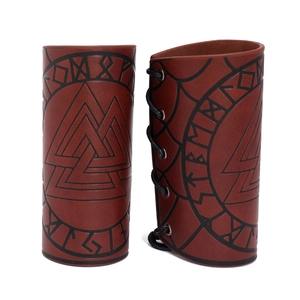 Brown Viking leather bracers with Valknut totem and Nordic runes in punk rock style