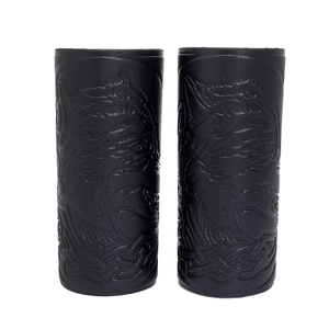 Detail of embossed wolf head and Celtic knot patterns on black PU leather arm guards