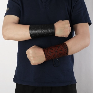 Detail of Viking leather bracer with Vegvisir totem embossing in black and dark red