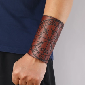 Brown leather arm guard with embossed Viking Vegvisir compass and Nordic rune patterns