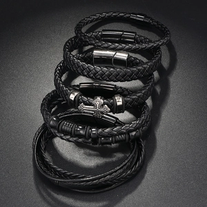 Set of five men's black braided leather bracelets with stylish metal magnetic clasps