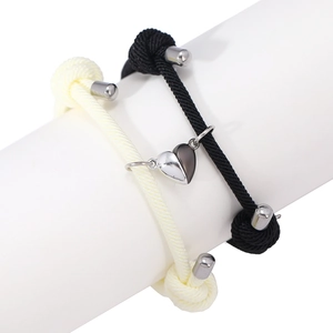 Magnetic matching heart charm woven rope bracelets for couples in black and cream white