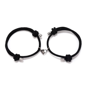 Adjustable magnetic heart couple bracelets with black and silver braided rope