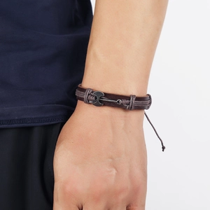 Men's dark brown hand-woven leather bracelet with a dark grey alloy anchor pendant