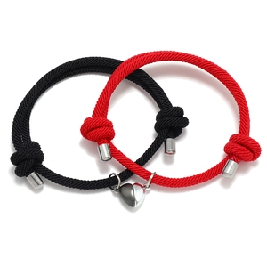 Adjustable magnetic heart coupling bracelets for couples in braided black and red cords