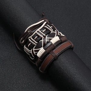Five-piece set of vintage braided leather bracelets for men in brown and tan tones