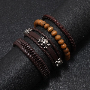 4-piece vintage leather wrap bracelet set with skull charms and brown wooden beads