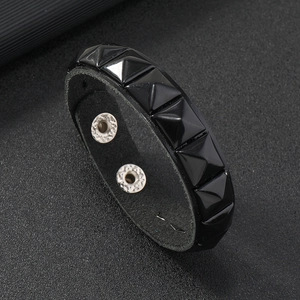 Men's punk black leather bracelet featuring square pyramid studs and snap button