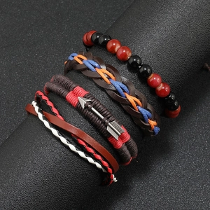 Mens multilayer leather bracelet set with beads and metal arrow charm on black stand
