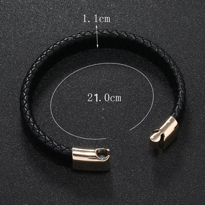 Detail view of woven black leather bracelet with gold magnetic clasp and 1.1cm width