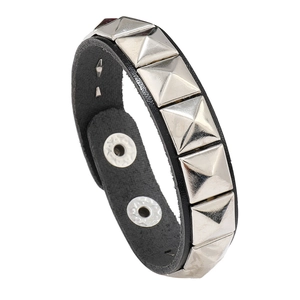 Men's punk leather bracelet with silver pyramid studs and double snap button closure