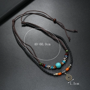 Vintage multi-layer turquoise beaded leather necklace with antique bronze coin pendant