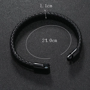 Close-up of black braided leather bracelet with magnetic metal clasp showing 21cm length