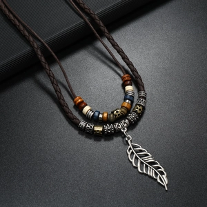 Retro multi-layer beaded necklace with vintage silver leaf pendant on dark brown cord