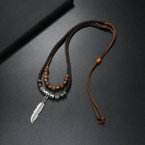 Retro multi-layer men's necklace featuring silver feather pendant and beaded leather cords
