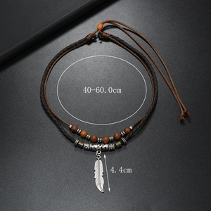 Ethnic double-layer braided necklace with silver feather pendant and wooden beads