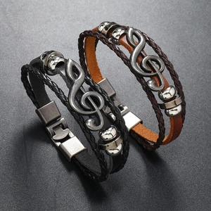 Men's vintage multi-layer braided leather bracelet featuring a silver treble clef music note