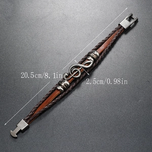 Detail view of multi-layer leather bracelet with music note charm and size measurements