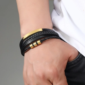 Men's multilayer woven black leather bracelet with magnetic clasp and gold metal accents
