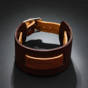 Vintage wide brown leather bracelet with punk wolf head embossing and silver metal buckle