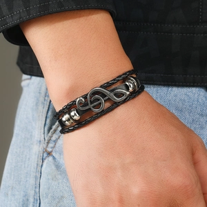 Men's punk leather bracelet featuring treble clef charm and multi-layer braided cords