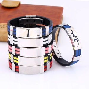Macro shot of colorful silicone bracelets with geometric patterns and steel plates