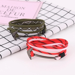 Nautical anchor woven rope bracelets in olive green and bright red with metal clasps