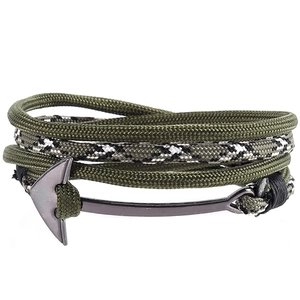 Detail of multi-layer olive green braided rope bracelet with a gunmetal anchor clasp