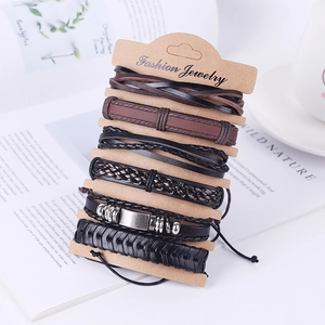 Set of six vintage braided leather bracelets in black and brown with metal accents