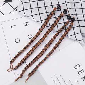 Vierdelige set handgemaakte gevlochten armbanden in bruin en zwart waxkoord