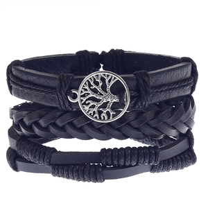 Set of four black braided leather bracelets featuring a vintage tree of life charm detail